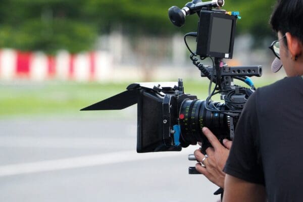 Behind the scenes of vdo production or video shooting at outdoor.